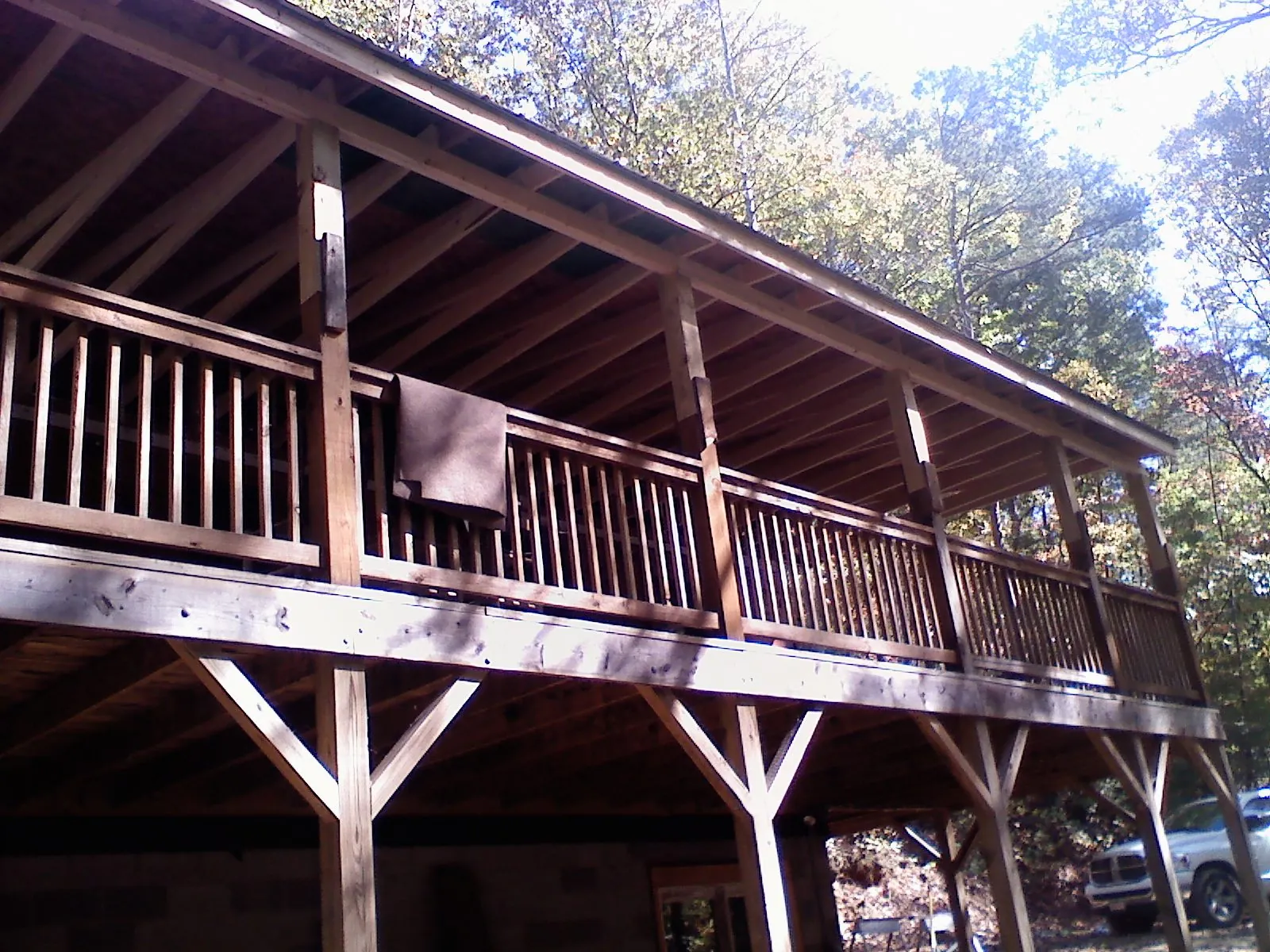 Timber framing under a new elevated porch and deck — Roof Leak Repair in Moody by Roofing Brothers
